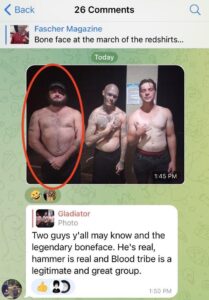 screencap of telegram post including photograph of three shirtless men posing for the camera. garner fisher is on the left and wears a black hat and jeans. he has several visible tattoos, which is nothing compared to the person in the center--boneface--whose entire face and head are covered in ink. interestingly, his semi-bloated abdomen is the only visible part of his body that is not tattooed. the man on the right has wet hair and it appears he's spent time outdoors in a sleeveless tank, based on his tanlines. his hair is wet. behind the men there is a caution sign posted, as one might see at a hotel pool.